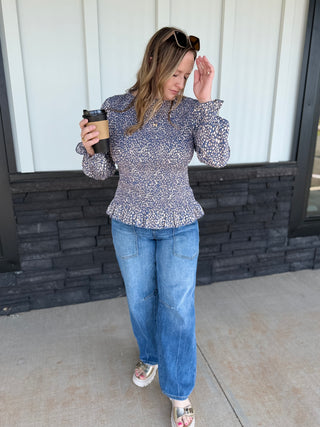 Smocked Peplum Animal Print top
