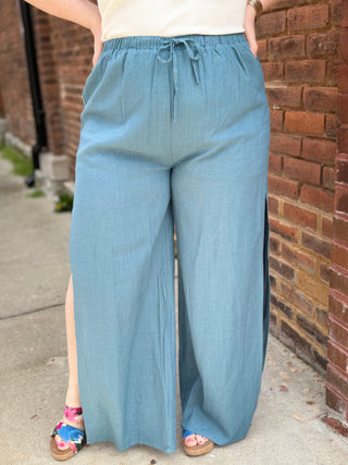 Blue linen pants with slit detail
